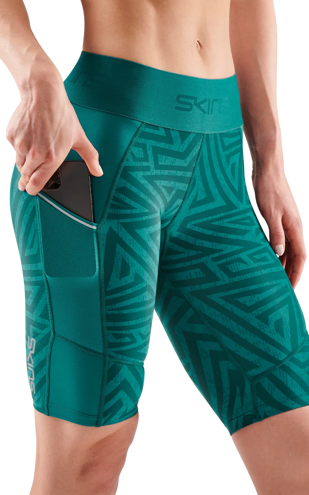 SKINS Women's Compression Half Tights 3-Series - Lt. Teal Angle