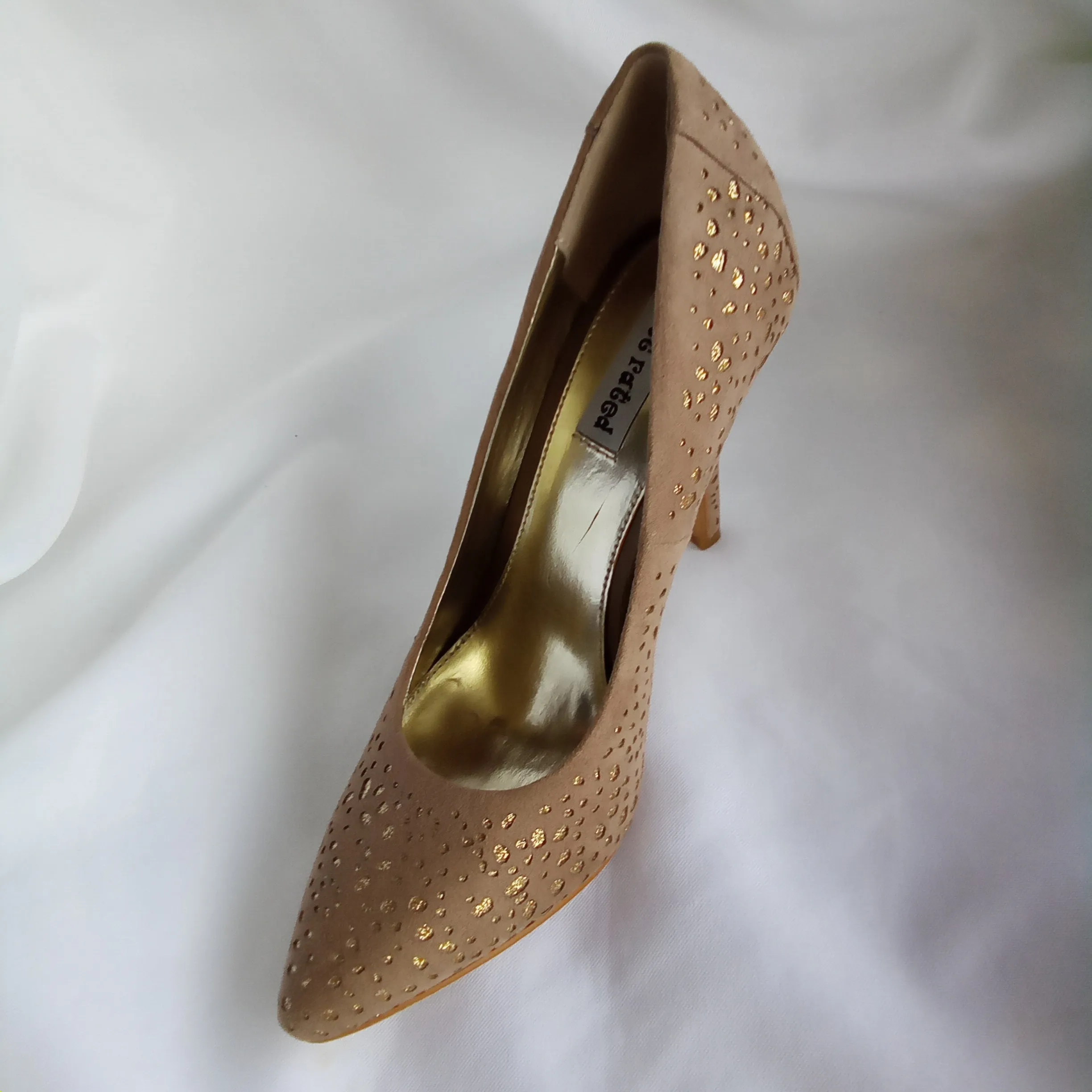 Taupe and Gold Pumps or Heels | Not Rated | Magnetism